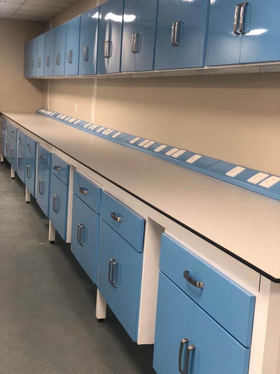 Row of laboratory base cabinets and worktops